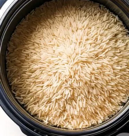 Put uncooked rice in a slow cooker with these 4 ingredients.